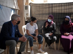 The High Commissioner for Refugees, Filippo Grandi, attending to Hind al-Hamad a 41 year old Syrian refugee, (the overseer of 3 camps) and Majida Shehada Ibrahim,36 years old Syrian refugee,(to the right of the image) while they explain what they need and what they are short of in the camp.