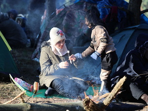 Refugees and migrants people gather on the Belarusian-Polish border