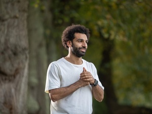Egypt. Liverpool striker Mo Salah pays a virtual visit to refugees and local children studying in a classroom