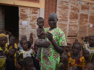 A father and his child at a centre for internally displaced families in Ouahigouya, Burkina Faso.