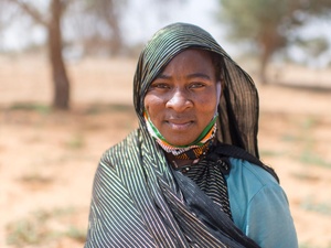 Rabi Saley, 35, who fled Mali after attacks on her hometown, found refuge in Ouallam, Niger, where she works on a market garden with other refugee, displaced and local women. 