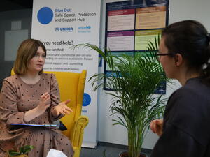 Poland. refugees from Ukraine getting psychological assistance at a UNHCR/Unicef Blue Dot in Warsaw