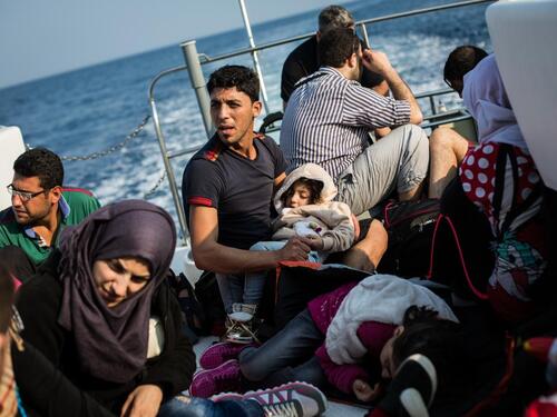 Syrian refugees on board a Hellenic Coast Guard vessel after being rescued in the Mediterranean sea, off the coast of Lesbos, Greece.