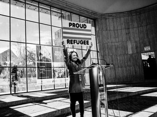 Nga Vương-Sandoval speaks in 2019 at a women's march in Denver, Colorado.