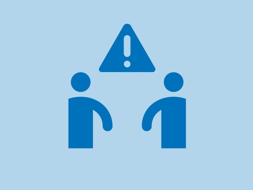 An icon of two people with a warning sign