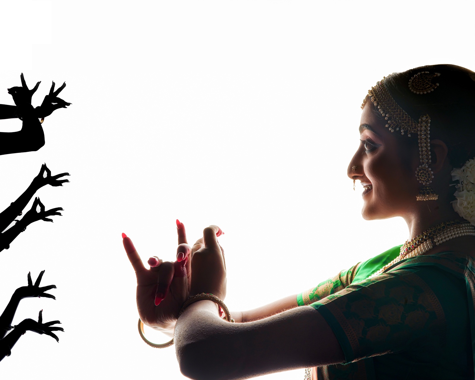 Photograph of a lady doing a traditional Indian dance by Gowri