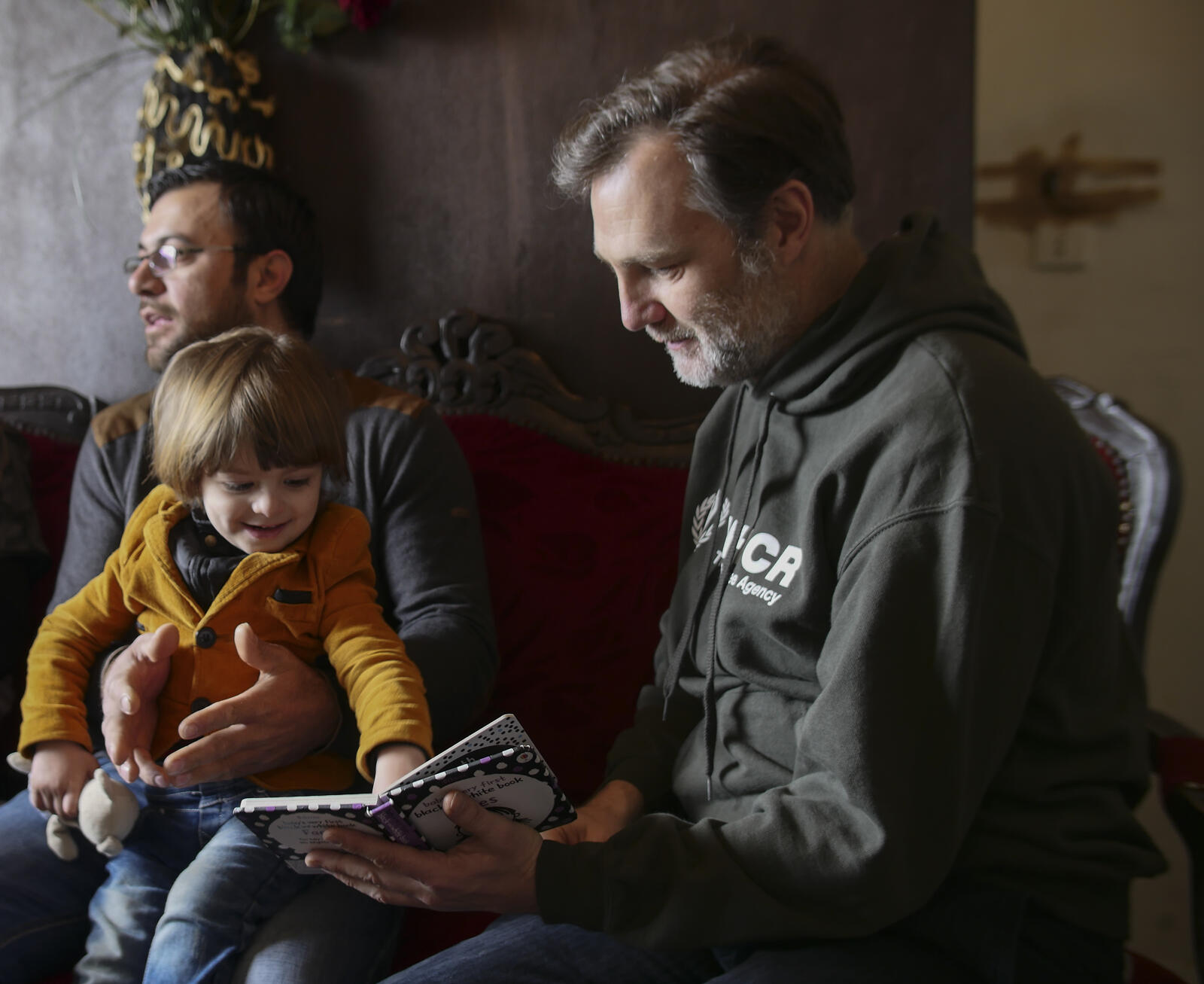 UNHCR Goodwill Ambassador David Morrissey meets Syrian refugees Talal Khaled Marwan (aged 32), his wife Maha (26) and their son Hisham in Lebanon