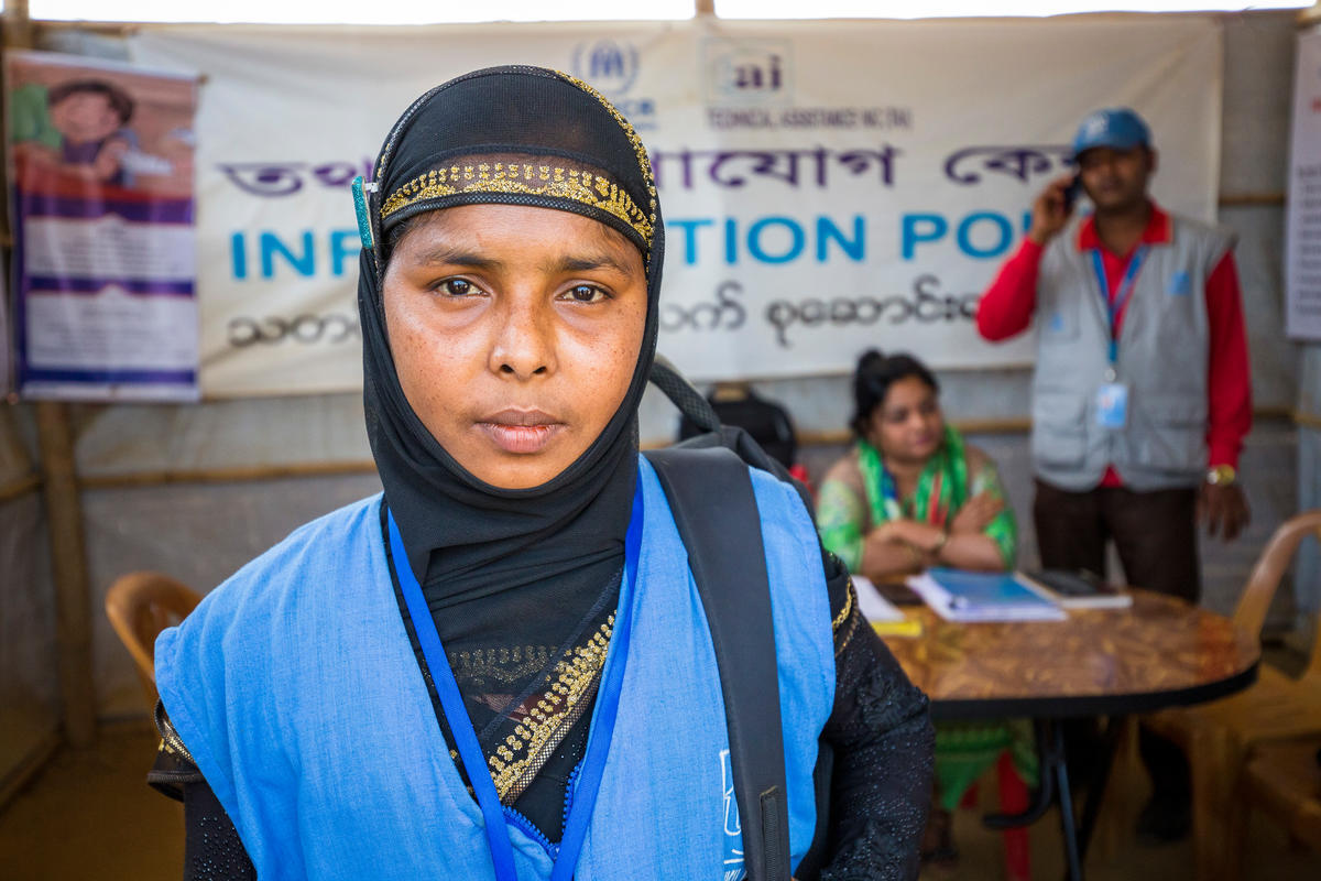 Bangladesh. Female head of households recieve assistance from Community Outreach Volunteers