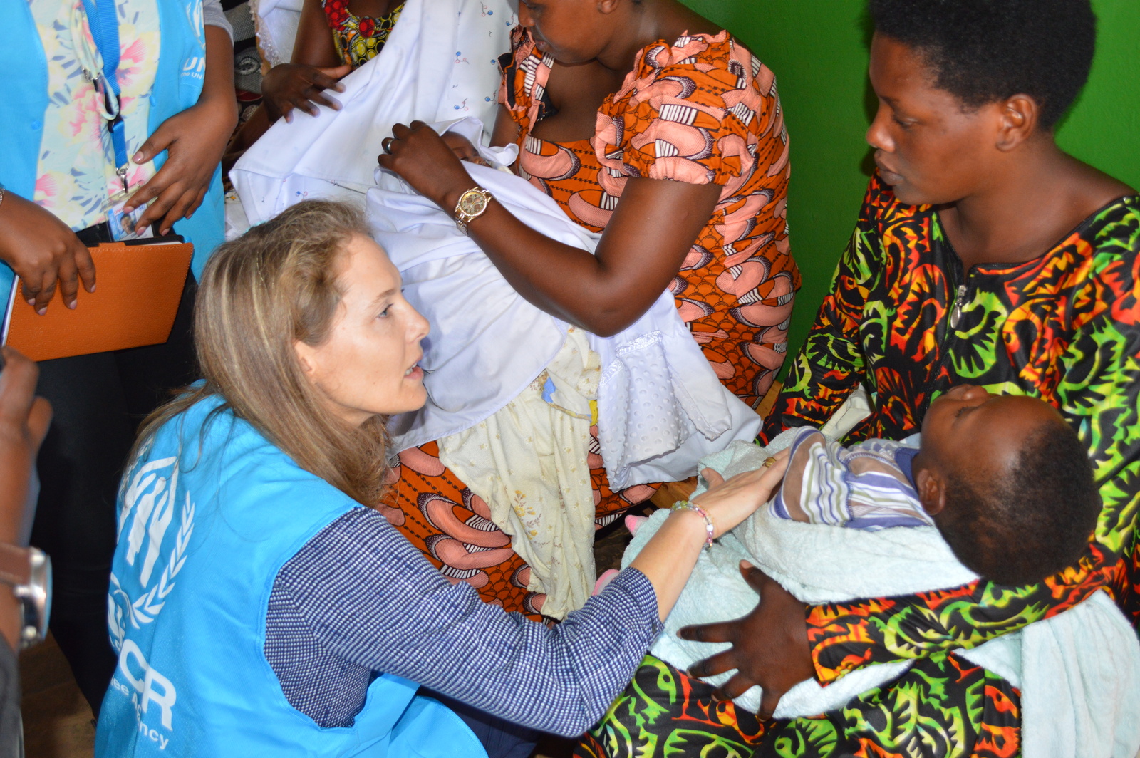UNHCR Patron, HRH Princess Sarah of Jordan, meets with a mother of a new born child at the mother care ward in Gihembe camp, Rwanda, to hear about the challenges that refugee mothers face daily, notably regarding feeding issues.