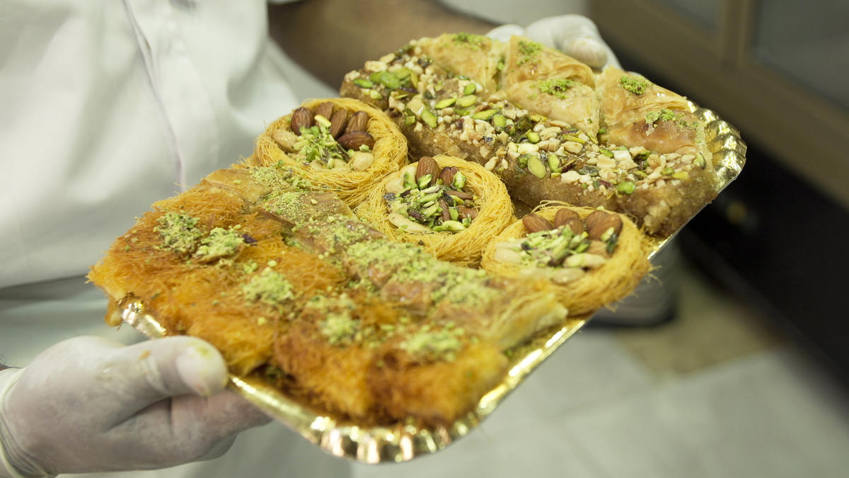 Egypt. Syrian refugees sell sweet memories of Damascus