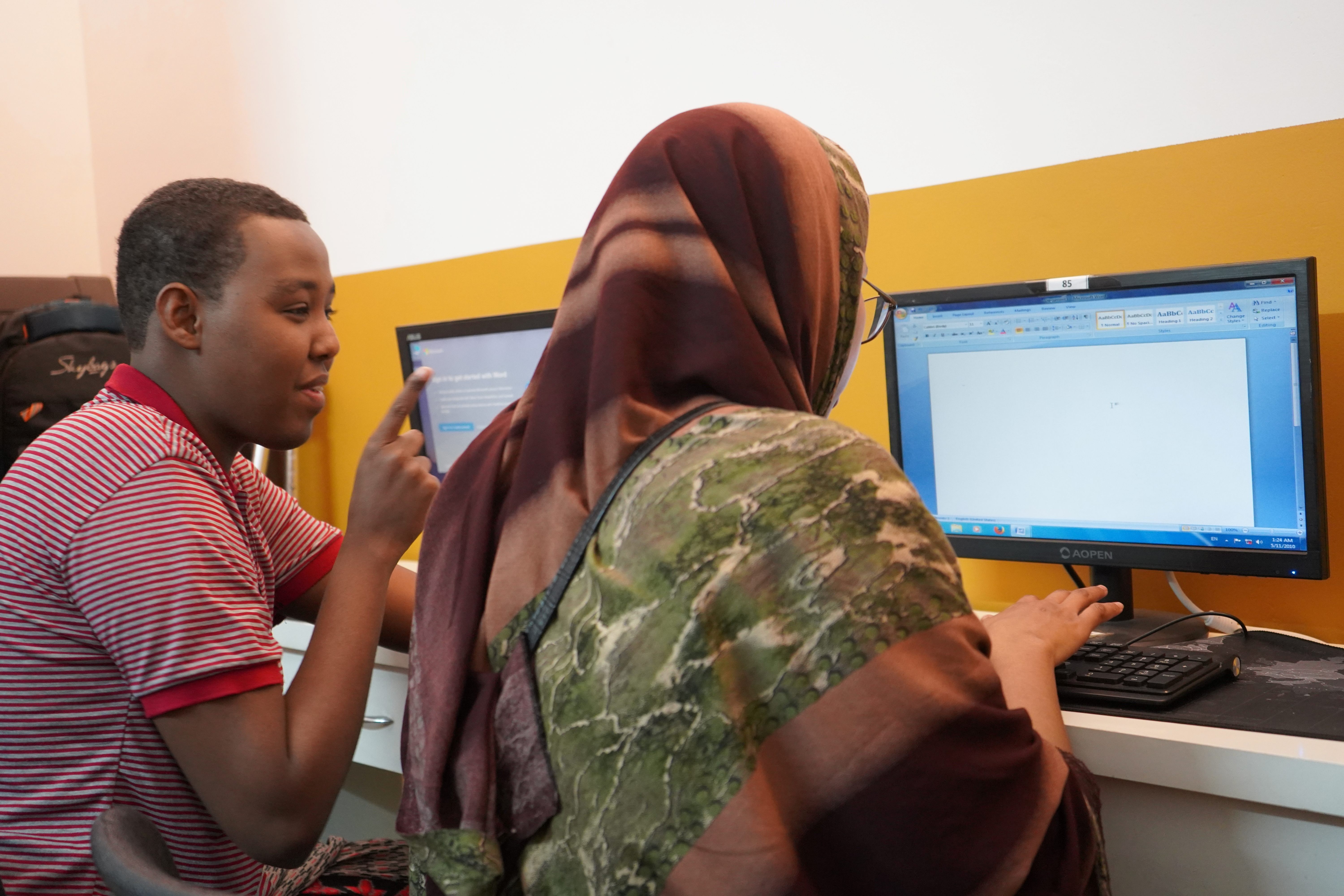Youth actively participate in computer lessons