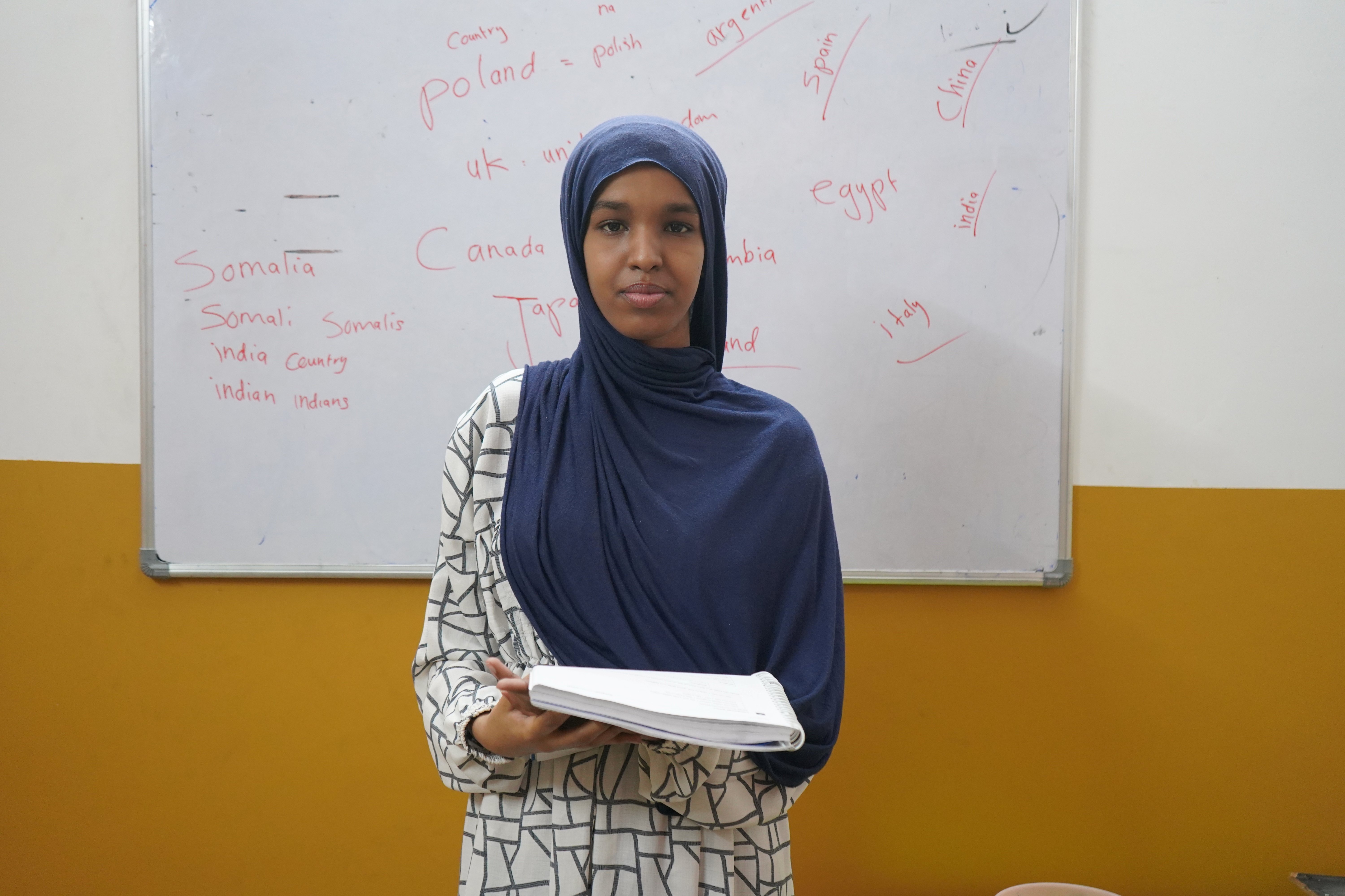 Seventeen-year-old Nimco, a Somali refugee, teaches children at the Centre, contributing to her family income while working towards her dream of becoming a fashion designer