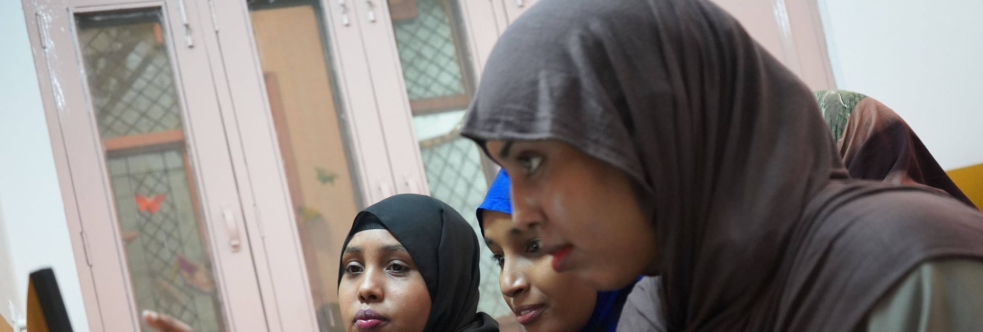 Young Somali refugees learn skills at the Sampushti Community Learning Centre in Delhi, building confidence through shared learning and peer support 