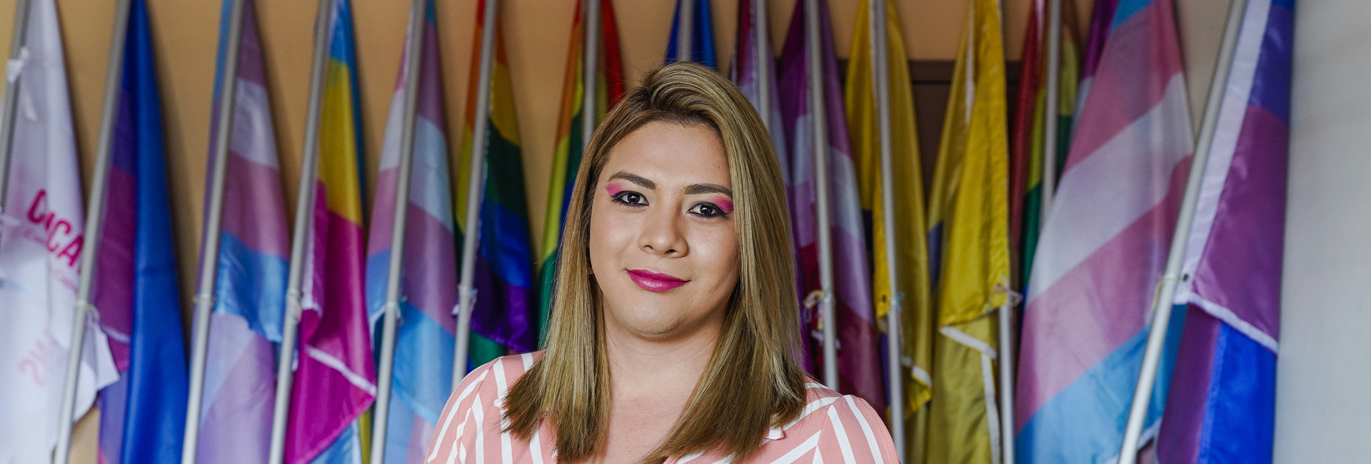 LGBT activist Bianka Rodriguez has her portrait taken at the offices of COMCAVIS Trans in San Salvador.