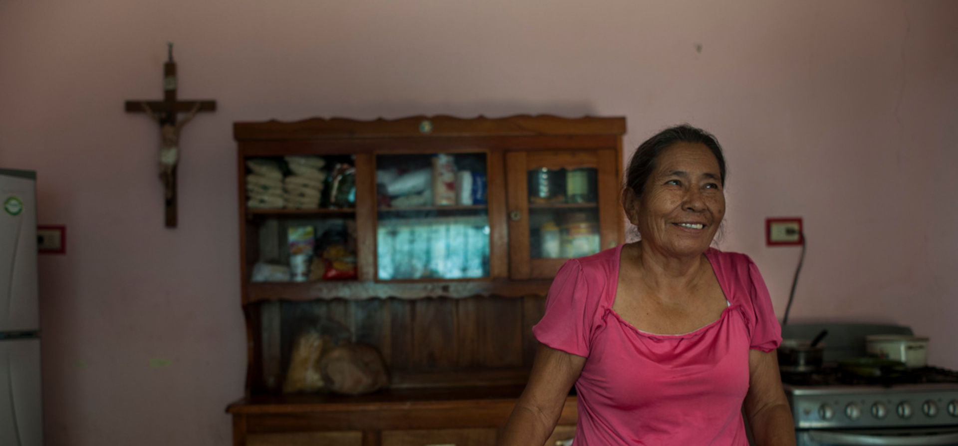 Elder woman escaped from violence of El Salvador, feels happy in her new life in Chiapas, Mexico.