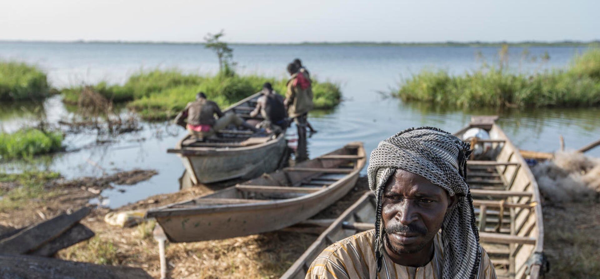 Chad. Nigerian refugees join local fishing community on shores of Lake Chad