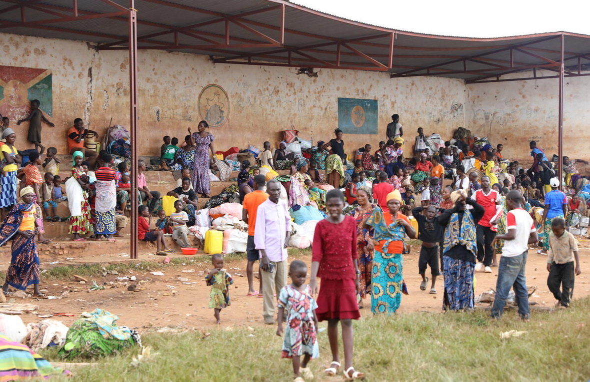 Families take shelter in a school
