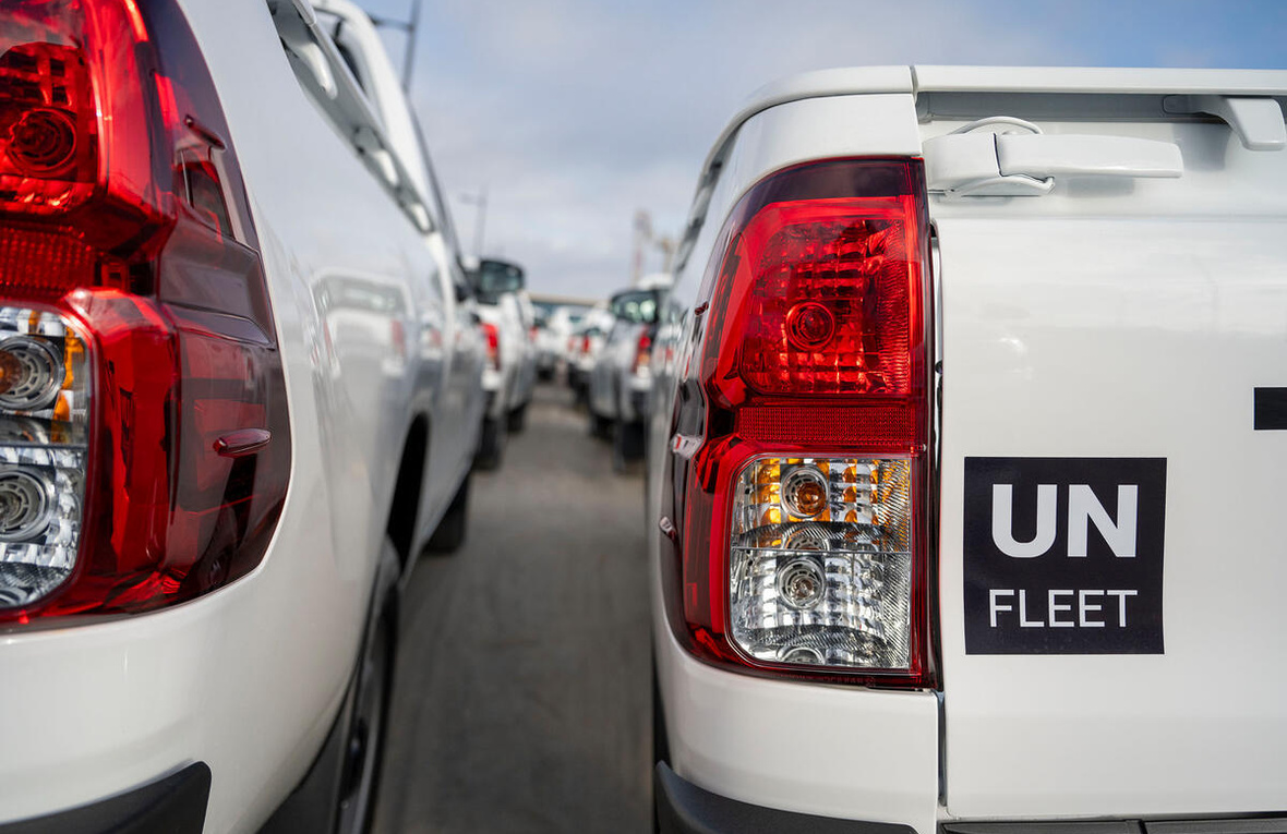 Close up of two UN FLEET vehicles, pictured from behind