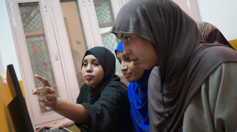 Young Somali refugees learn skills at the Sampushti Community Learning Centre in Delhi, building confidence through shared learning and peer support 