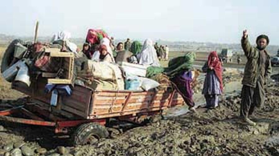 Afghan refugees returning home from Pakistan late last year.