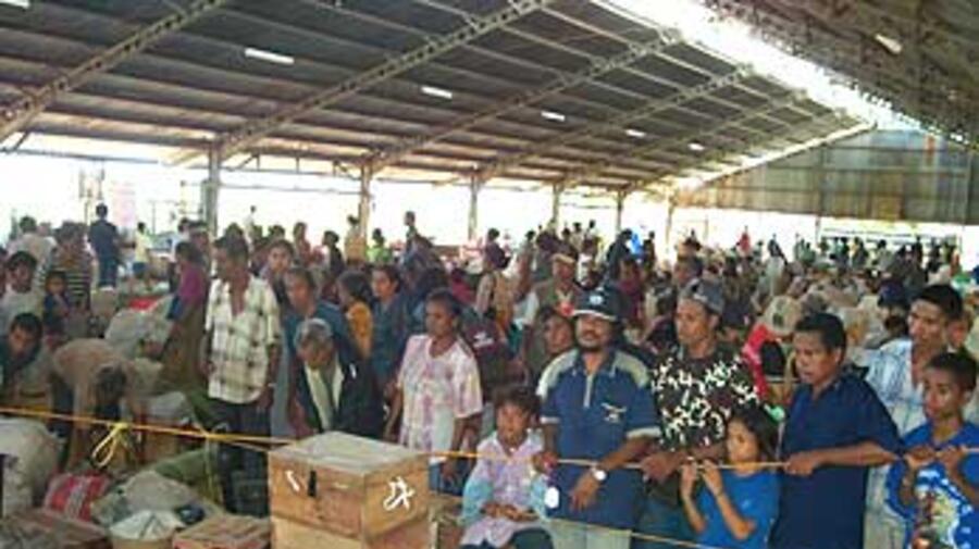 East Timor's refugees return from West Timor to celebrate independence on May 20.