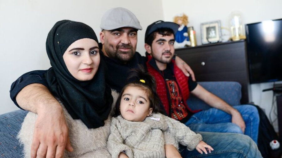 Canada. Newly arrived Syrian family at their home in Ottawa.