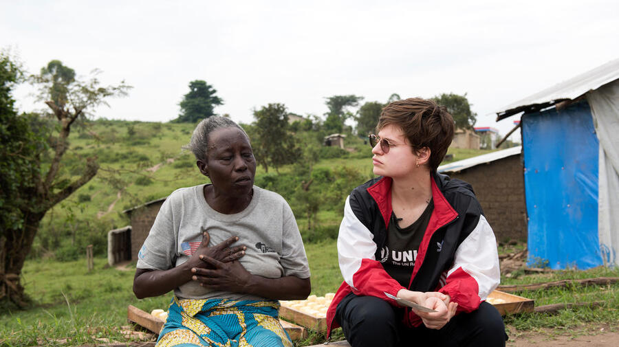 Uganda. Christine talks with Imani who works at the Bakery in Ramwanja camp