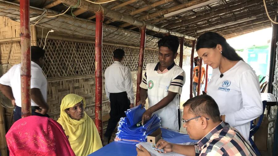 Bangladesh. UNCHR Associate Registration Officer Thais Severno helps register Rohingya refugees