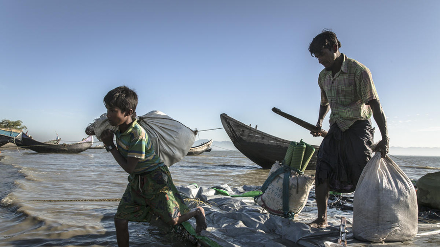 Bangladesh. Rohingya cross Naf River to reach refugee camps