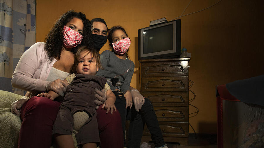 A displaced Venezuelan family who lost their income during COVID-19 pictured in their home in Santiago, Chile, in May 2020.