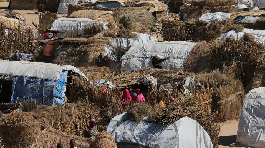 Nigeria. Thatched homes at the Muna Internally displace peoples camp in Maiduguri, Nigeria