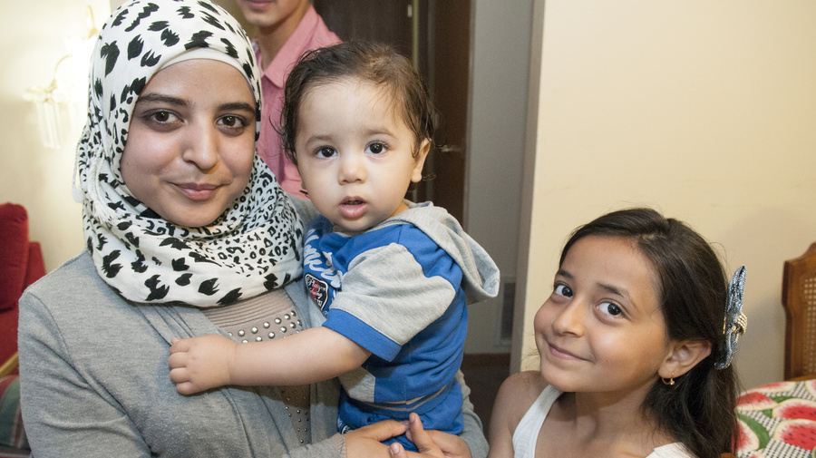 A refugee family from Syria pictured at their home, in May 2016. They were previously resettled to the United States from Jordan.