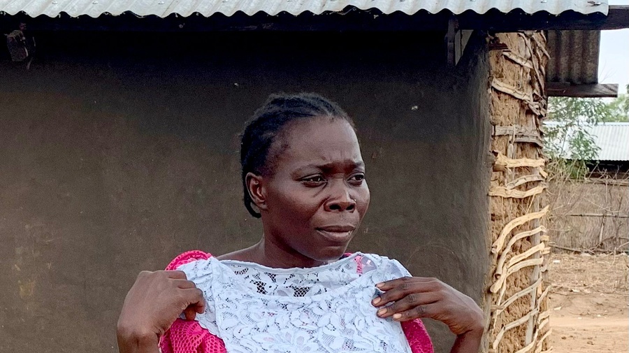 South Sudan. Clementina and her family receive new clothes