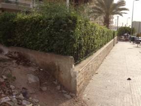 The Challenge: A street corner in Beirut - sometimes the only latrine option in the area around registration centers.