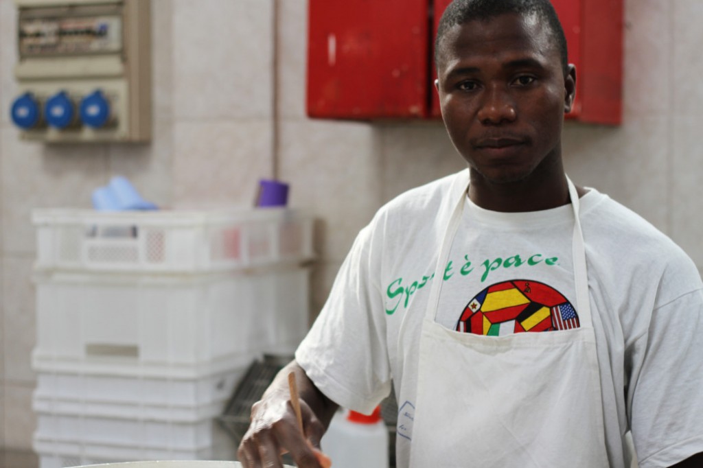 Photo of Sulieman who runs the yogurt shop run my refugees