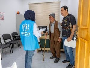 UNHCR staff renews certificate of refugee