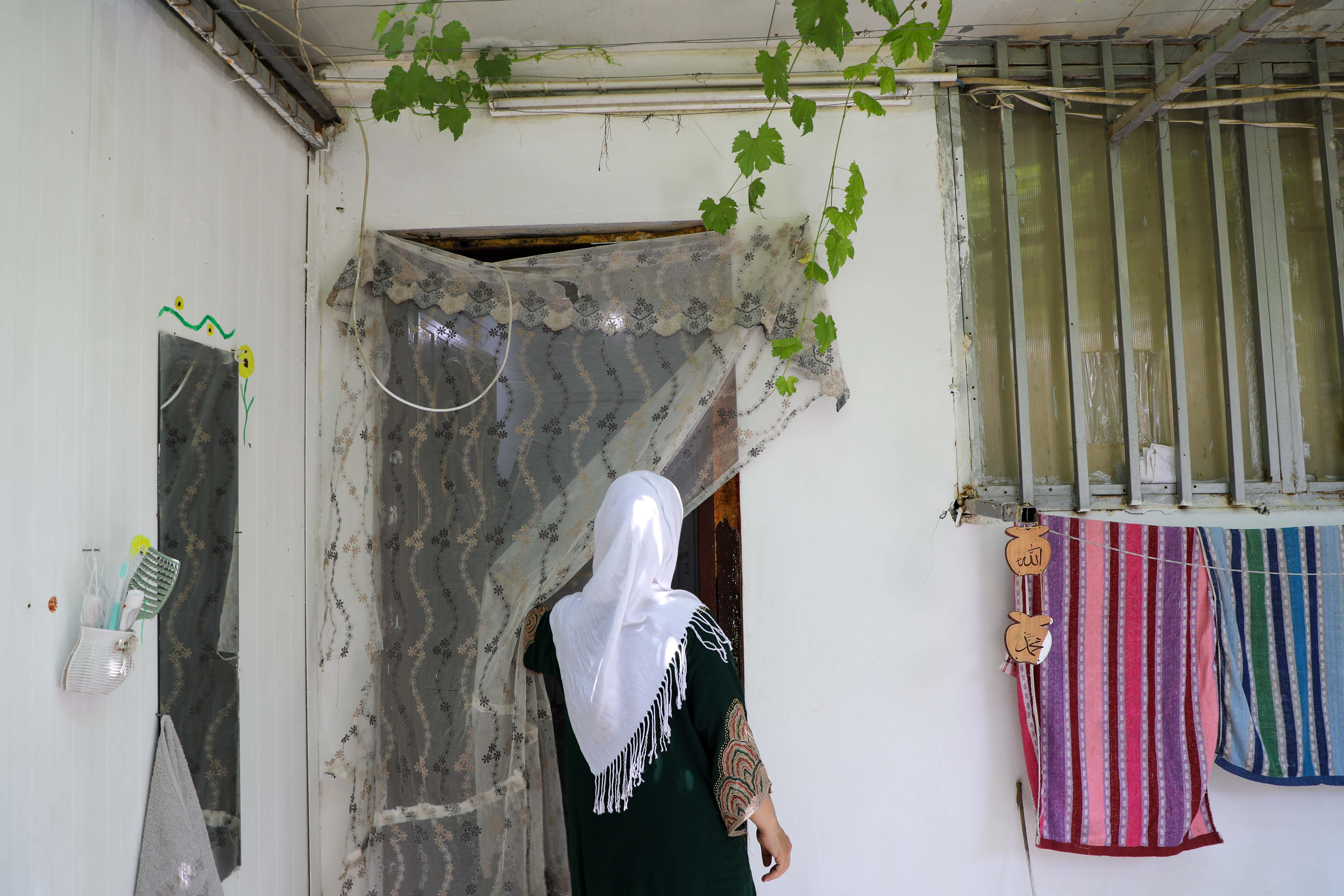 Shylan at home in Domiz Refugee Camp in Dohuk. 