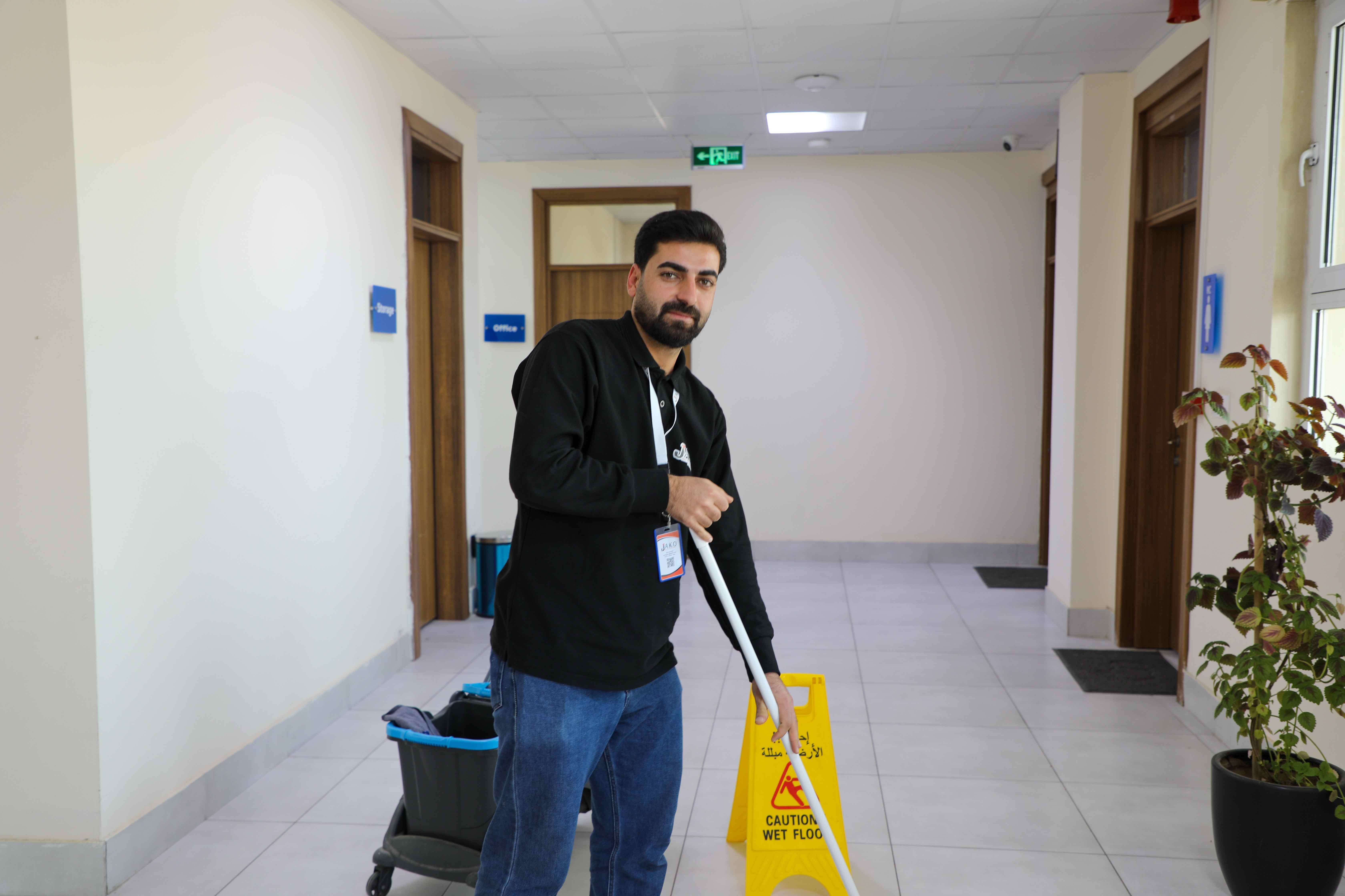 Barzan during his daily duties at the UNHCR Registration Centre in Baherka. &copy; UNHCR/Lilly Carlisle