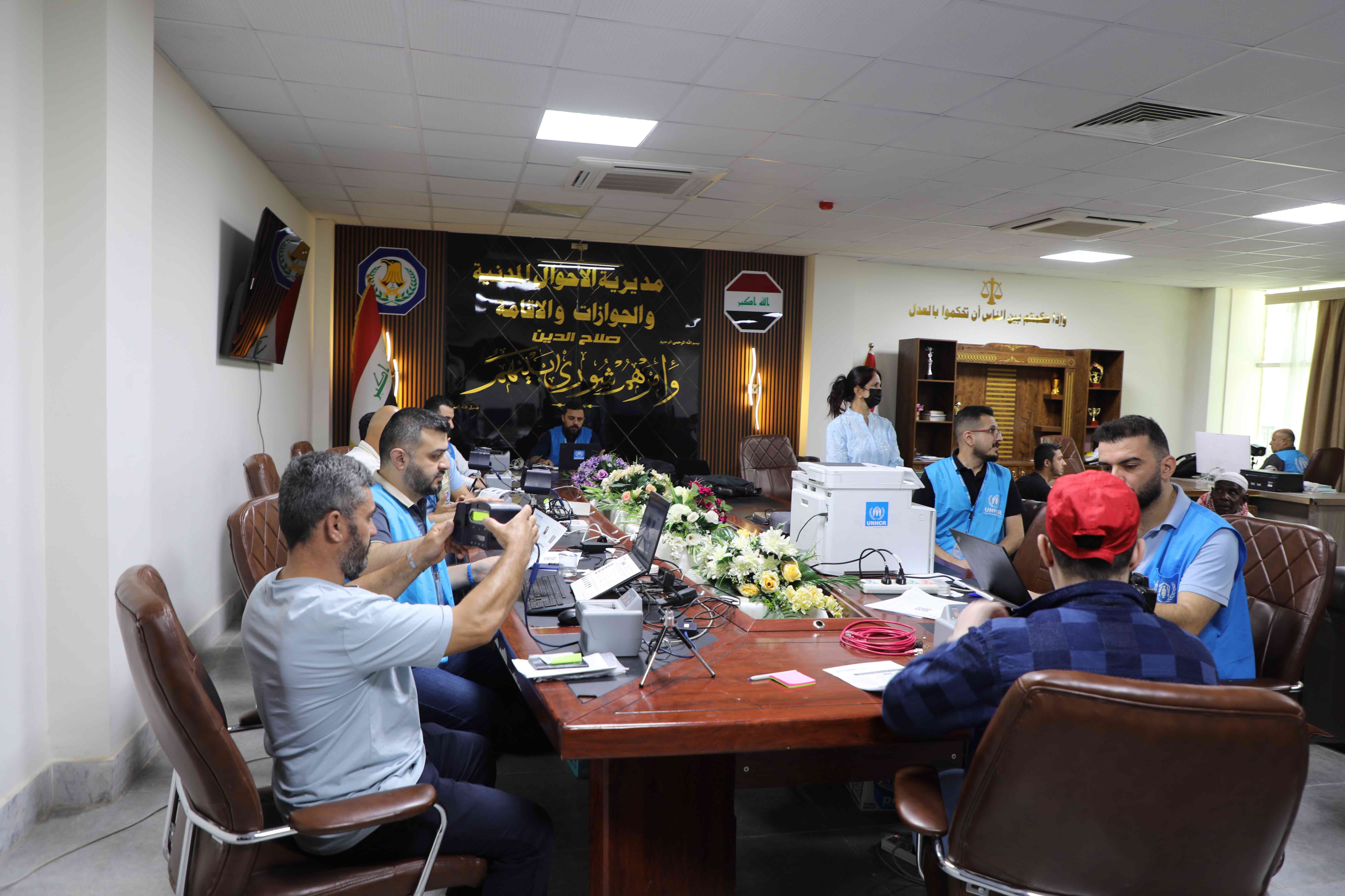 UNHCR staff process registration and certificate renewals for refugees in Salah al-Din Governorate, helping them maintain valid documentation and access protection and services.&copy; UNHCR/Viola Eleonora Bruttomesso