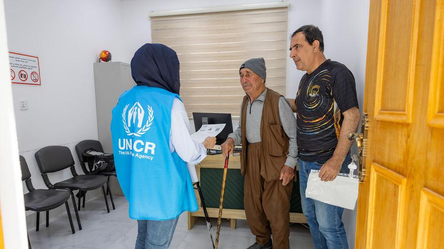UNHCR staff renews certificate of refugee