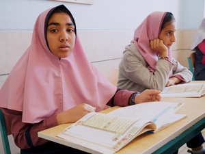 Iran. Afghan refugee sisters go to school for the first time