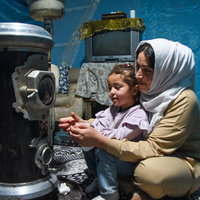 Lebanon. Khadija Ayman Tamer, mother of 3 (2 girls, 1 boy) living in an informal settlement with her husband and children and their cat