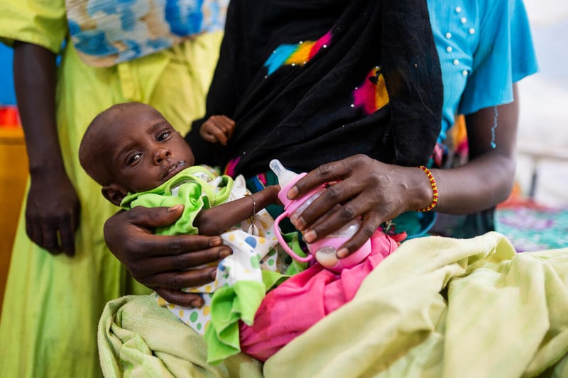 Sudanese women and her son