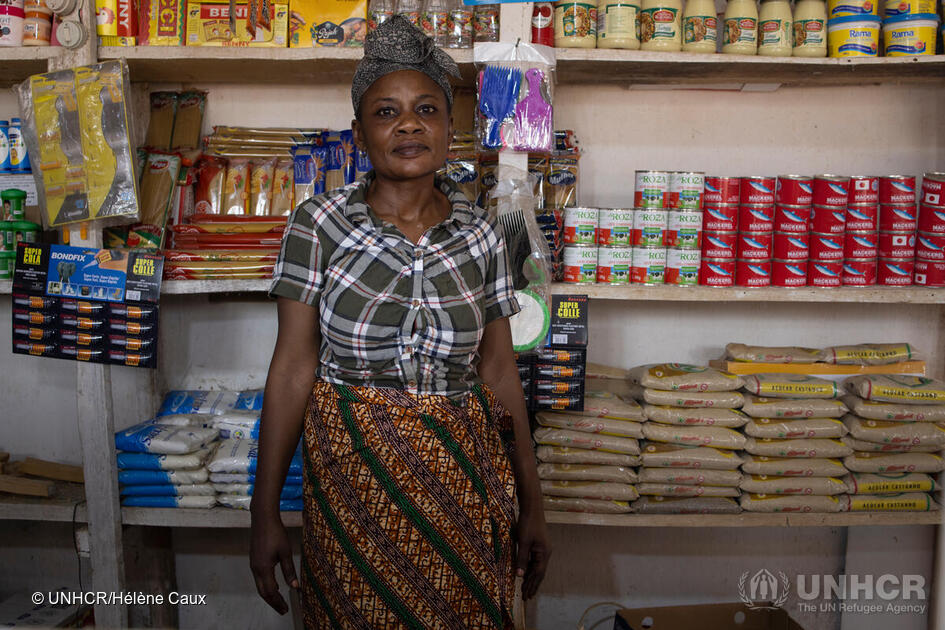 Mozambique. Refugee woman in her shop in Maratane settlement