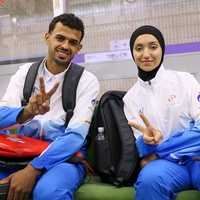 Mahmoud and Tala on the subway in Nagoya, Japan. 