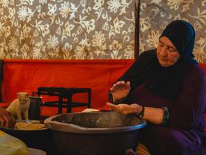 Jordan. Sabah with family inside their substandard shelter in Amman suburb