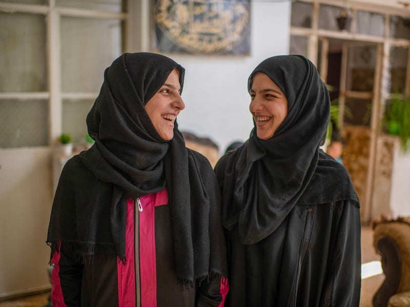 Syrian refugees and twins Shuruq & Ghuruq are pictured at home in Amman, Jordan. 