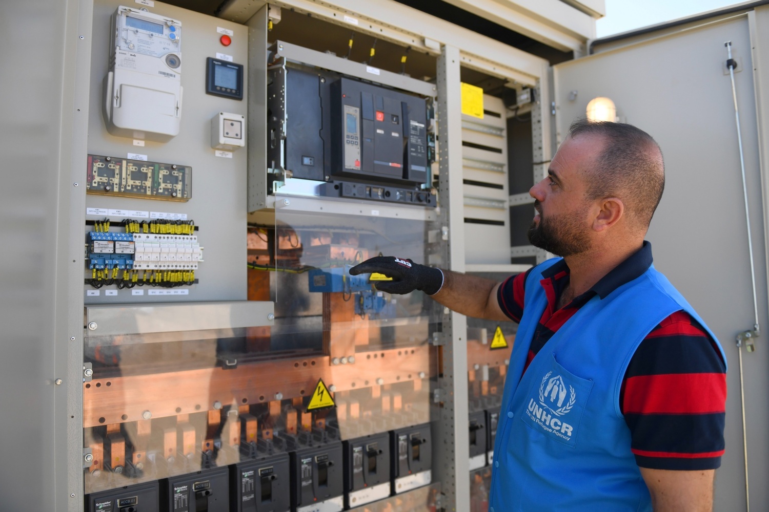 Hatem, a Refugee UN Volunteer in Azraq camp, who worked on the dispenser's project since day 1