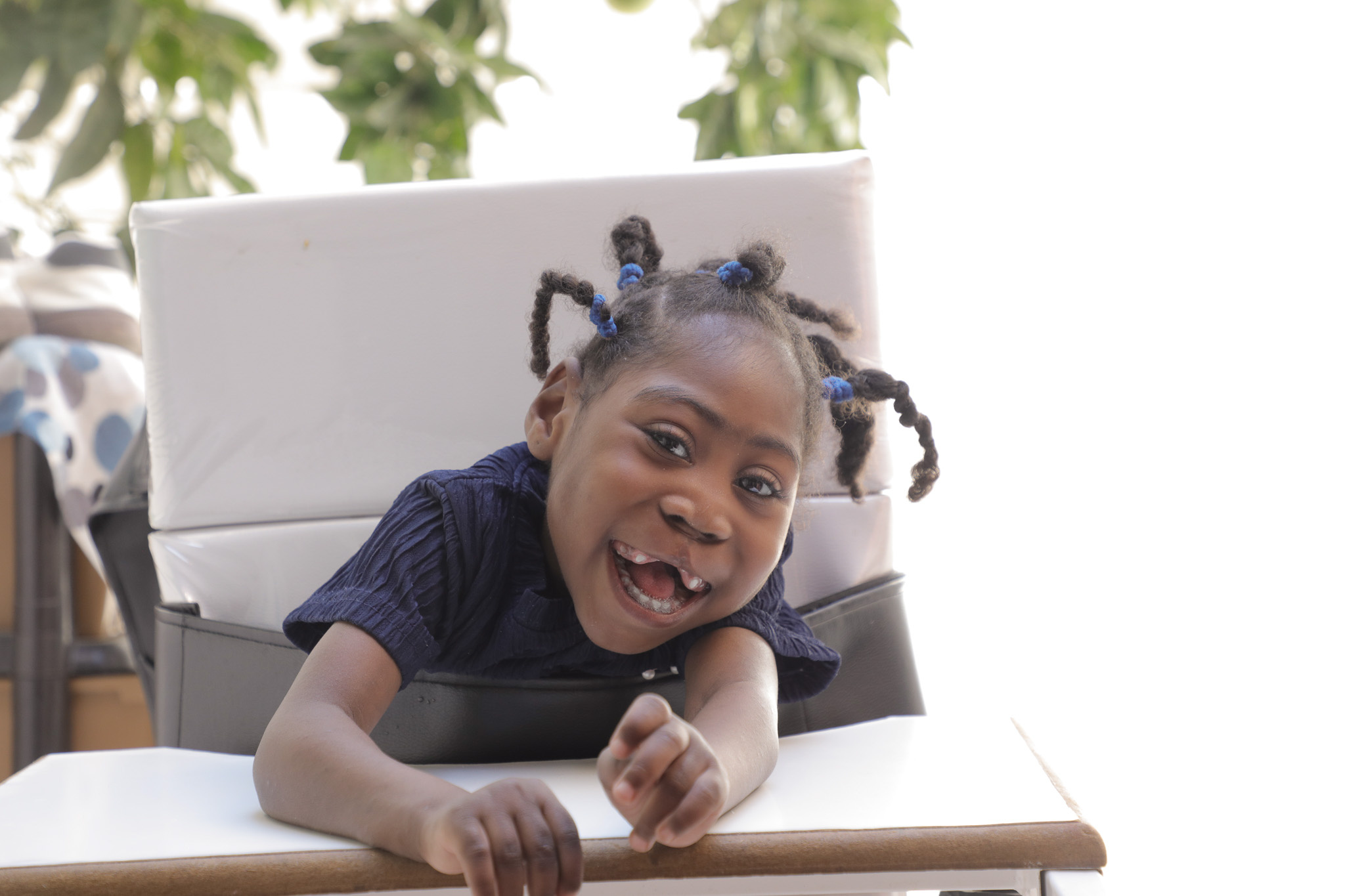 Areej, 6, Sudanese refugee, in her apartment in Amman.