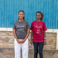 Tiba and Asuna pose for a photo in Kakuma